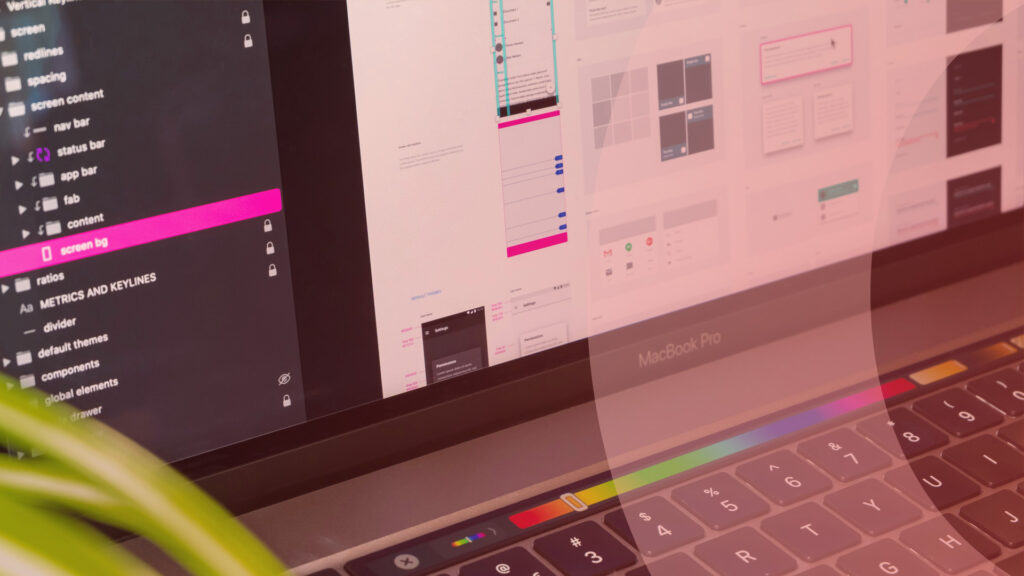 En laptop-skärm där det visas ett designsystem för en webbplats.